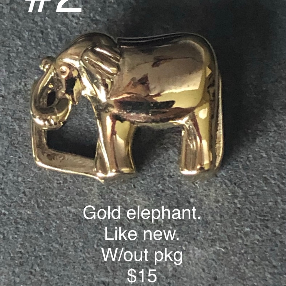 KEEP Collective gold elephant.
